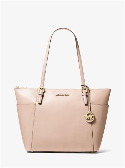 michael kors travel zip tote|Michael Kors Tote bag pink.